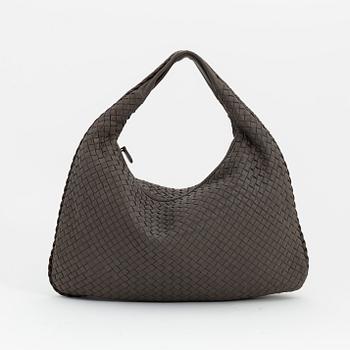 Bottega Veneta, a grey intrecciato leather bag.