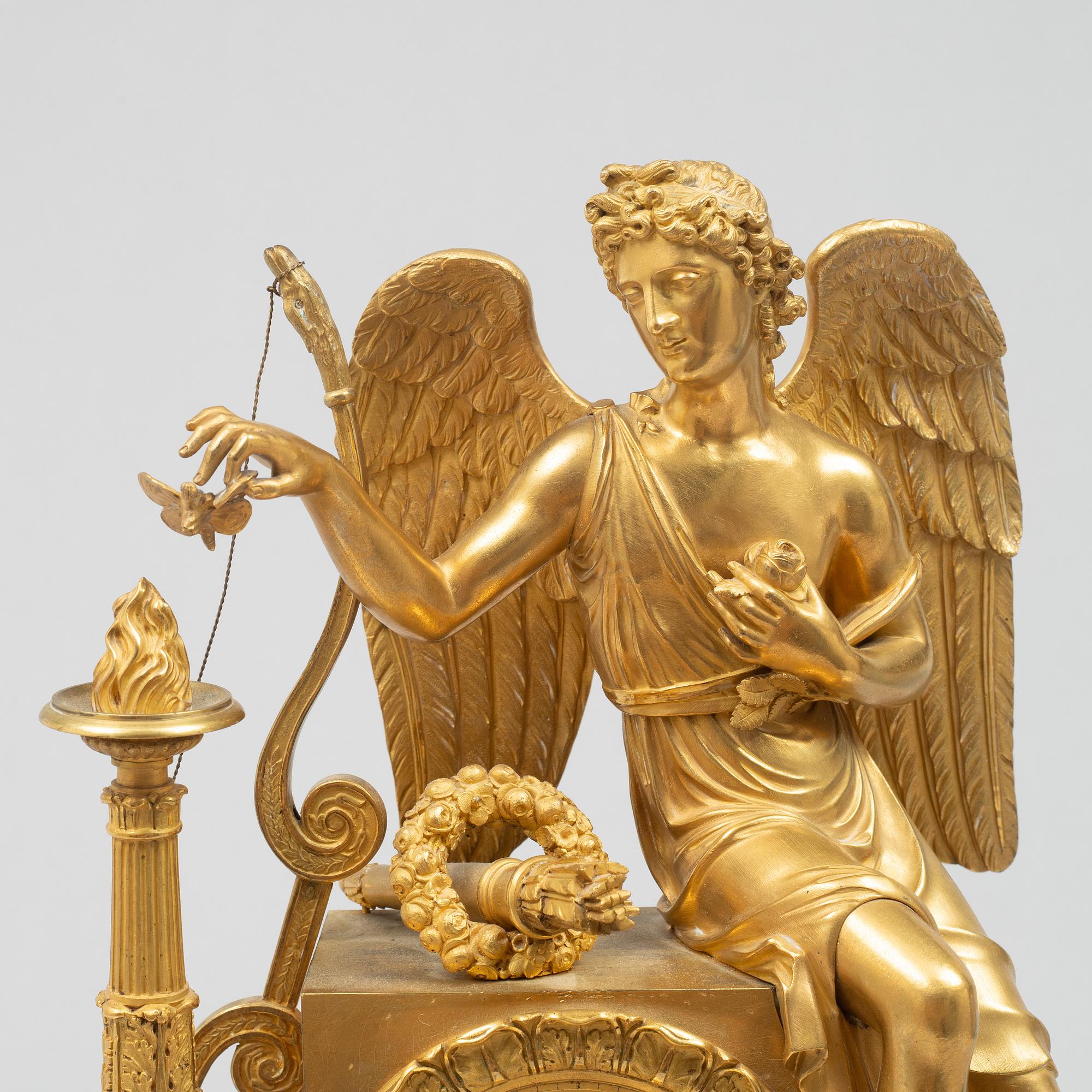An Empire mantel clock, first half of the 19th century.
