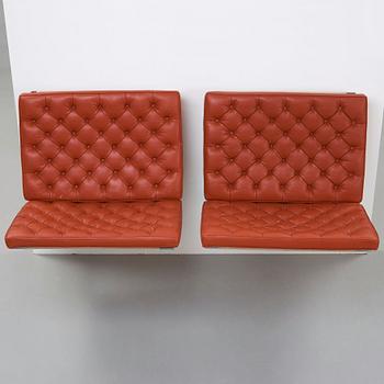 Poul Kjaerholm, A pair of "PK-26" wall mounted sofa sections, edition Fritz Hansen.