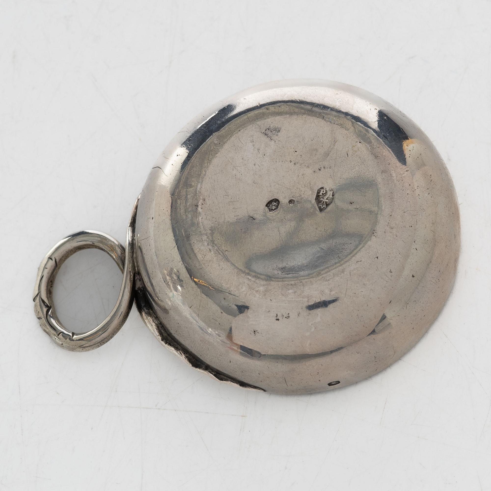 A French silver tastevin, mid-19th Century.