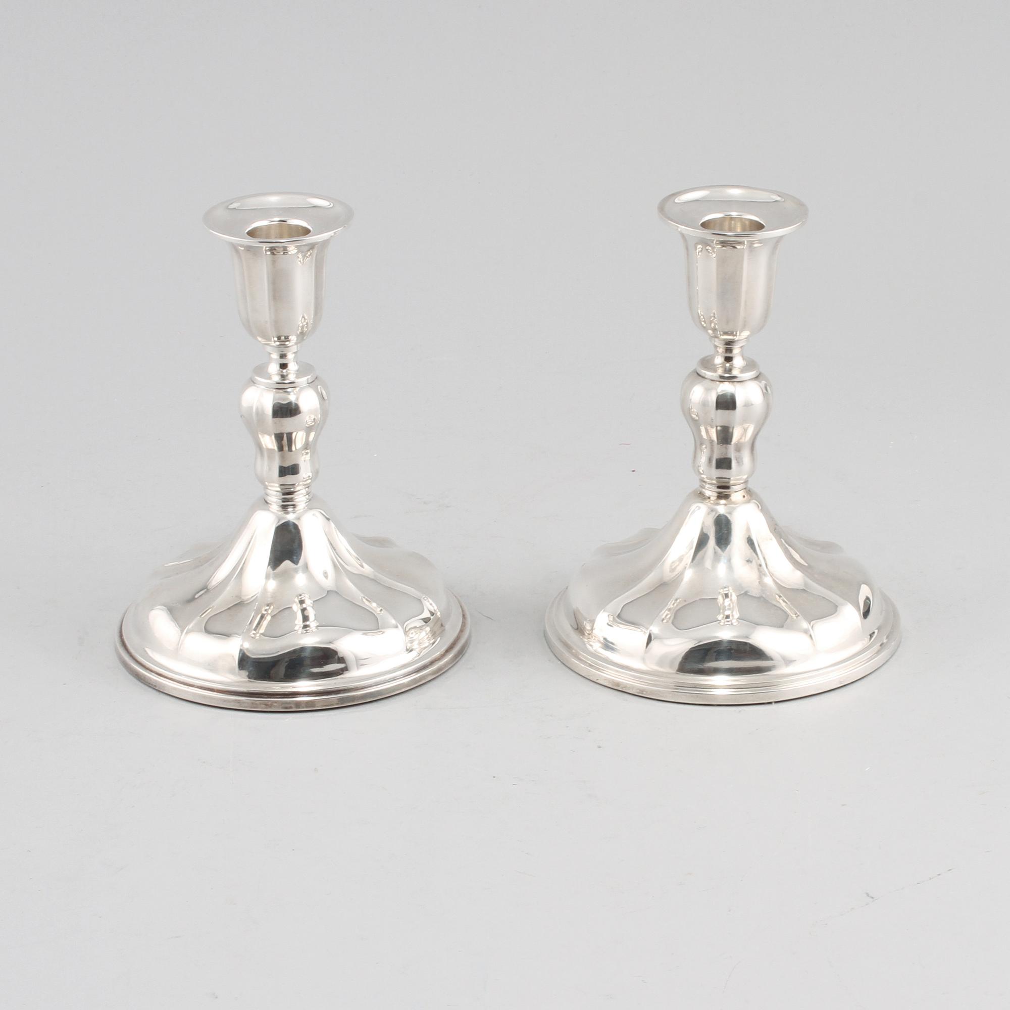 LJUSSTAKAR, ett par, silver, svenska importstämplar, 1900-tal.