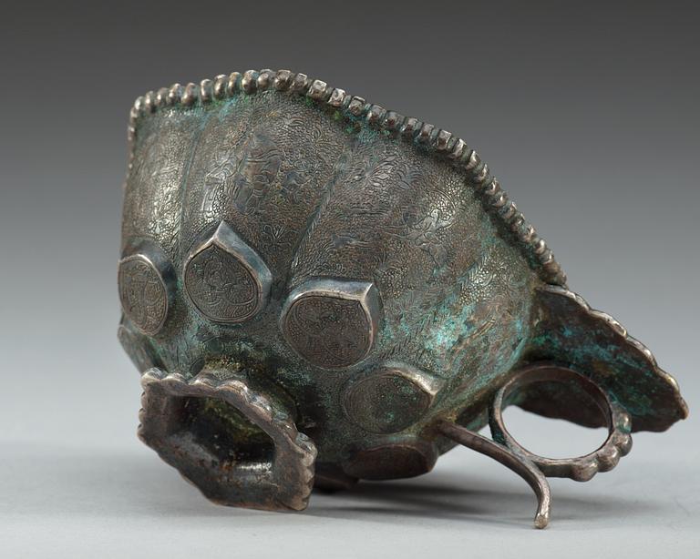 A petal shaped silver cup, presumably Tang dynasty.