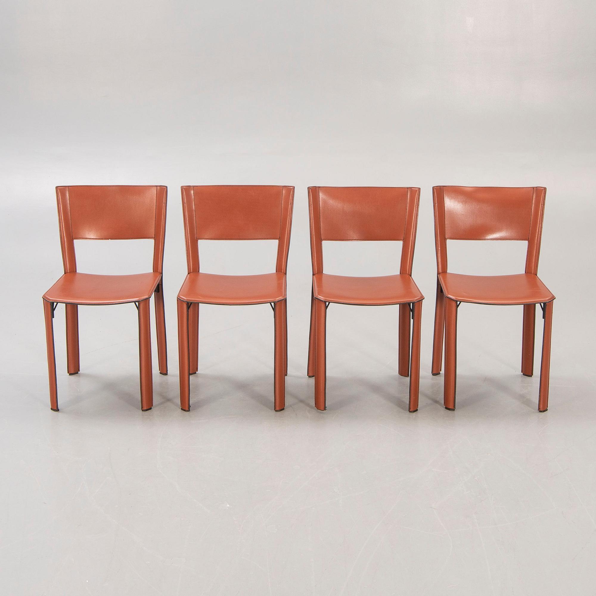 A set of four Matteo Grassi leather chairs later part of the 20th century.