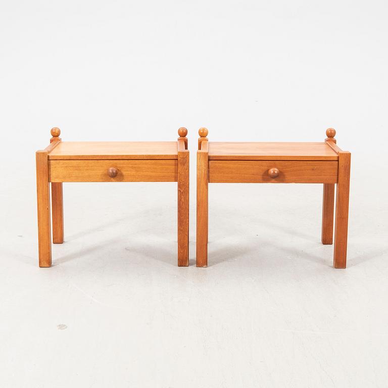 A pair of 1960s walnut bedside tables.