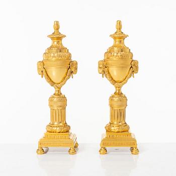 A pair of French Louis XVI style gilt-bronze casolettes, later part 18th century.