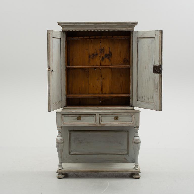 A 18th/19th century cabinet.