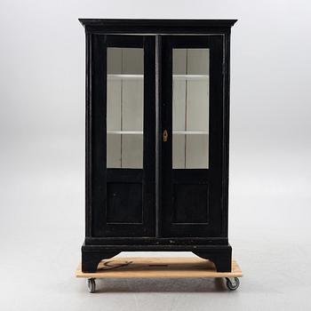 Display cabinet, circa 1900.