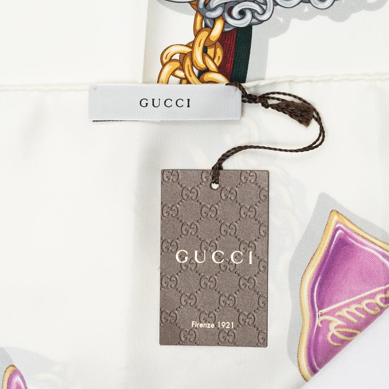 Gucci, a twill silk scarf.