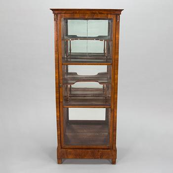 A mid-19th-century vitrine cabinet, possibly from the Baltics.