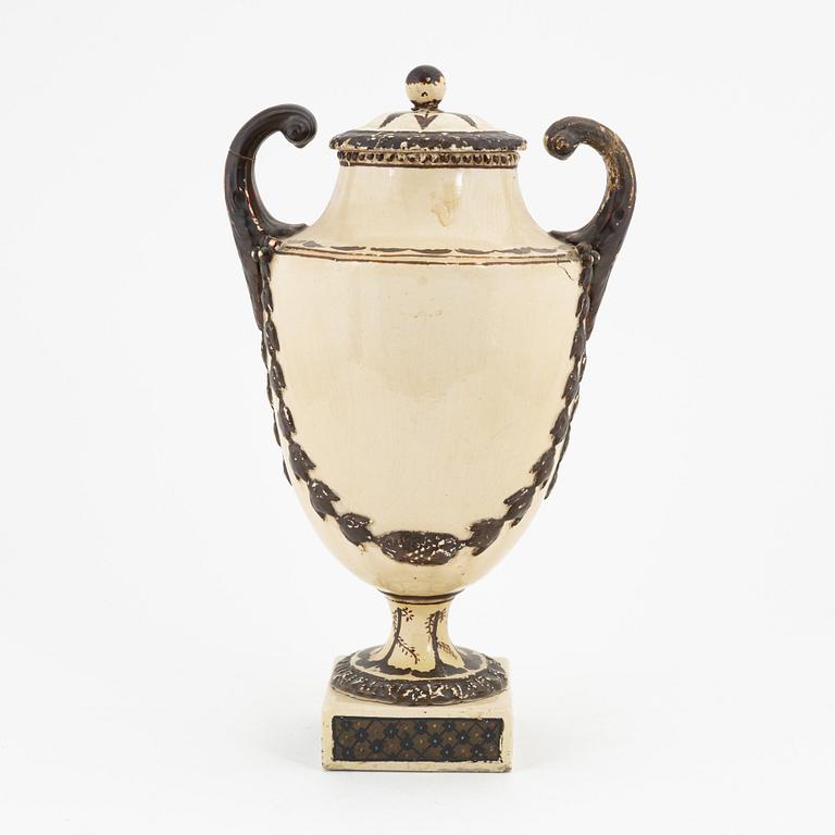 A creamware lidded urn, Late Gustavian, around 1800.