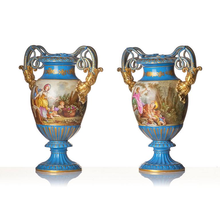A pair of large porcelain urns, Sèvres like mark, around 1900.