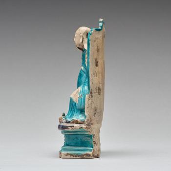 A turquoise and purple glazed figure of a dignitary, Qing dynasty, Kangxi (1662-1722).