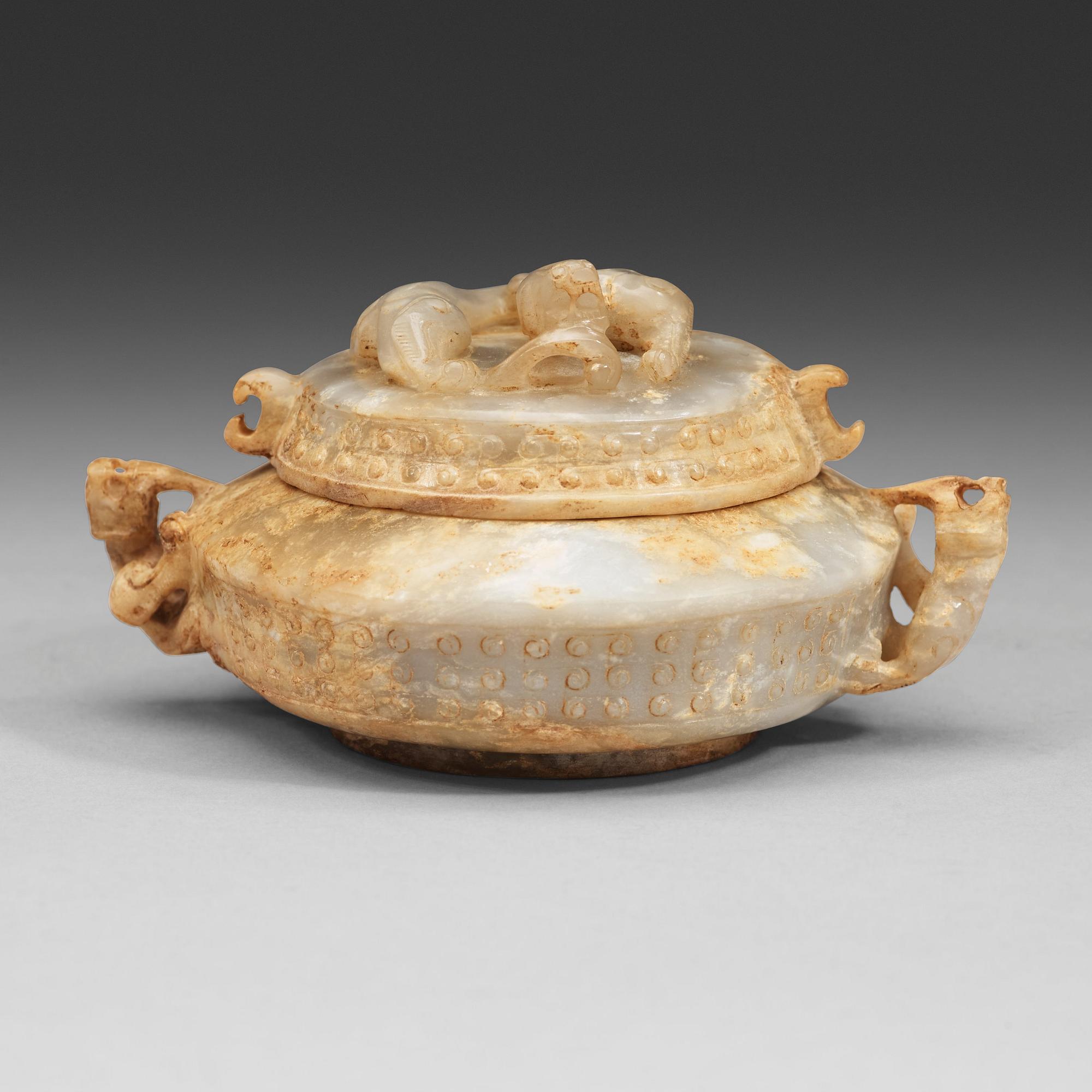 A Chinese nephrite jar with cover.