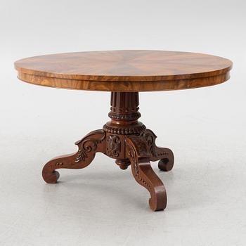 A mahogany salon table, around the mid-19th Century.