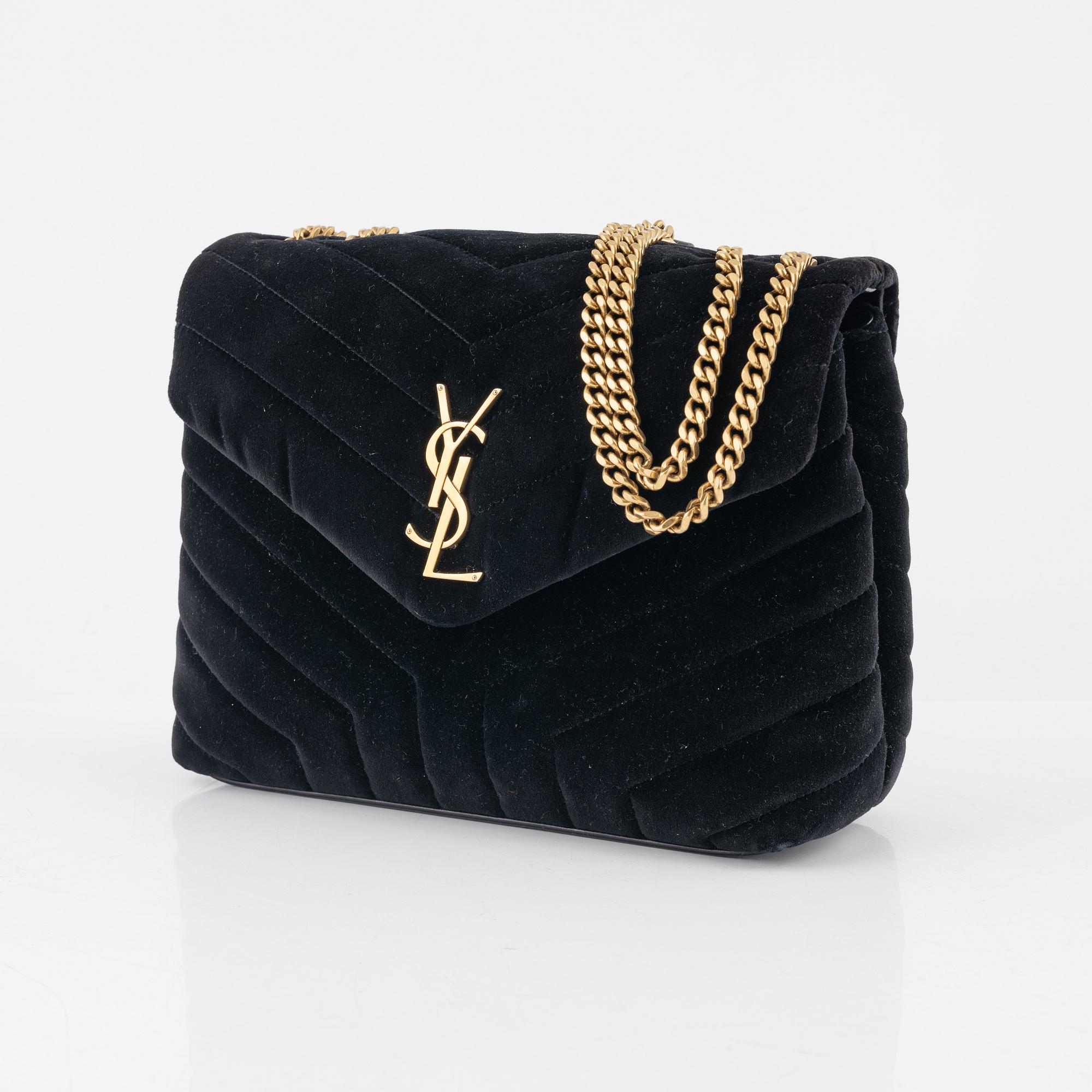 Yves Saint Laurent a black velvet LouLou bag. Bukowskis