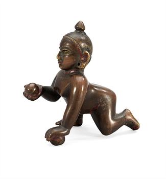 AN ASIAN BRONZE FIGURE,