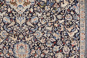 A Nain carpet, part silk, so-called 6 LAA, approx. 324 x 210 cm.