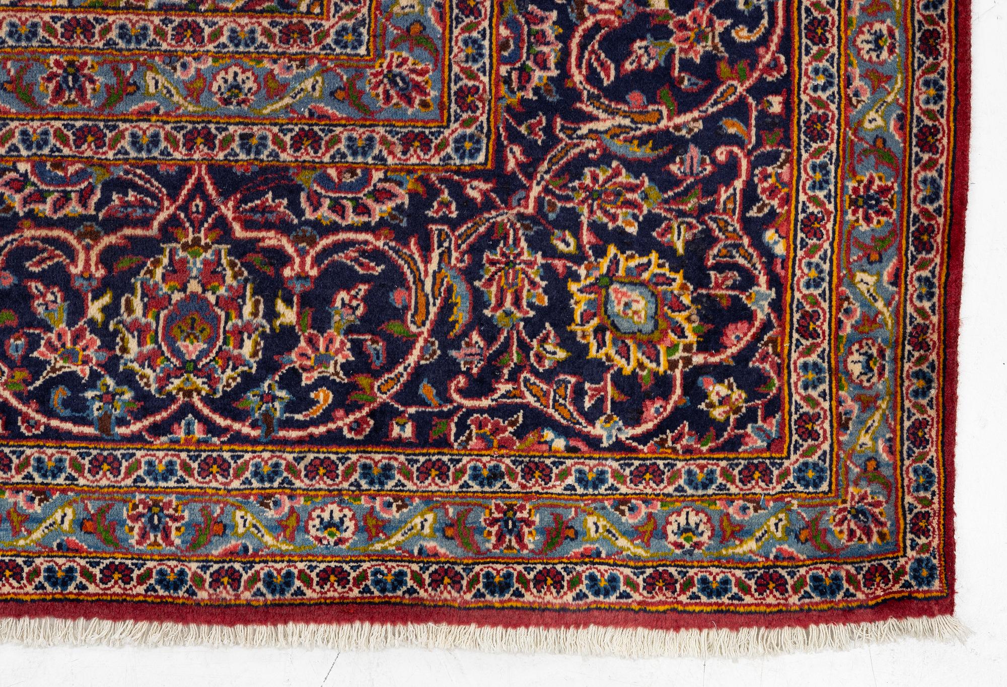A Keshan carpet, central Iran, signed c, 392 x 301 cm.