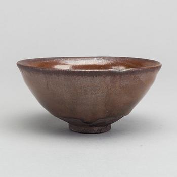 A Chinese glazed stoneware Song Dynasty temmoku bowl.