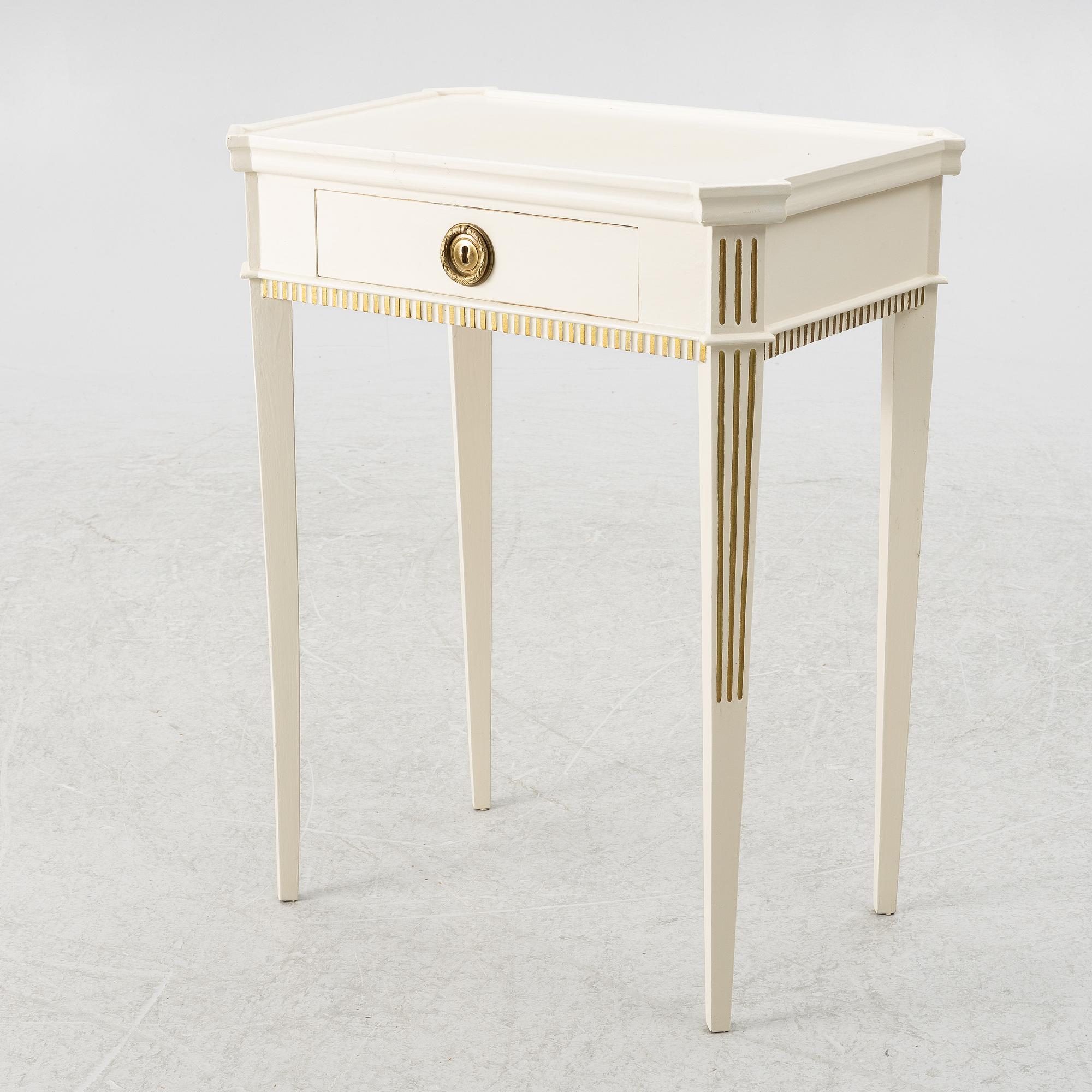 A Gustavian style side table, early 20th century.