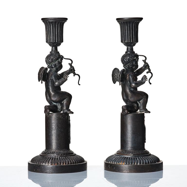 A pair of German (Berliner Eisen) Empire iron candle sticks.