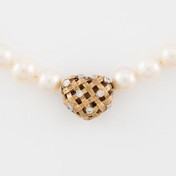 Ole Lynggard lås i form av ett hjärta 18K guld med runda briljantslipade diamanter.