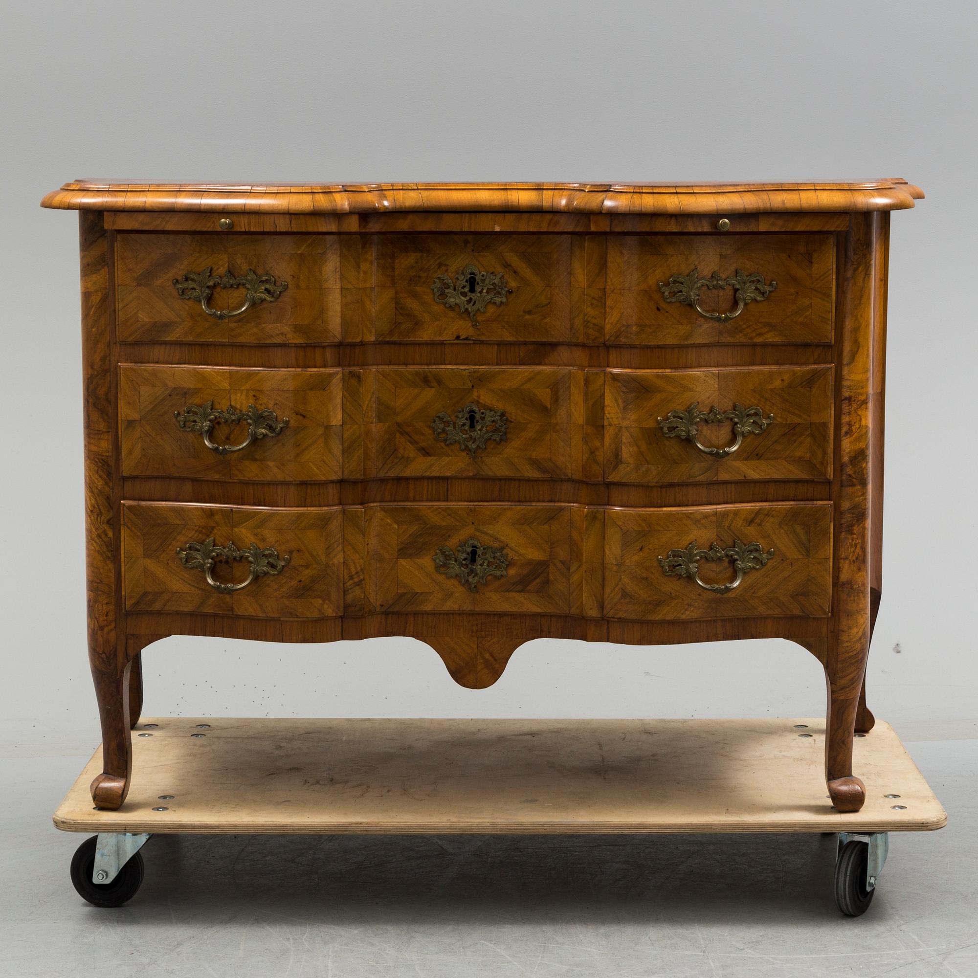 A late baroque mid 18th century chest of drawers by Christian Linning.