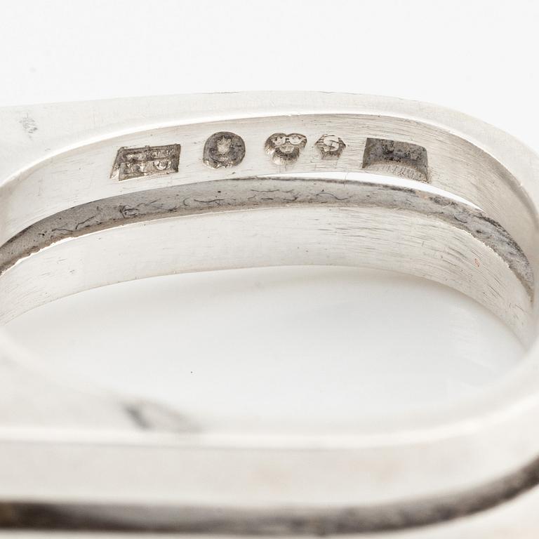 Rey Urban, brosch samt ring, silver med bergkristall.