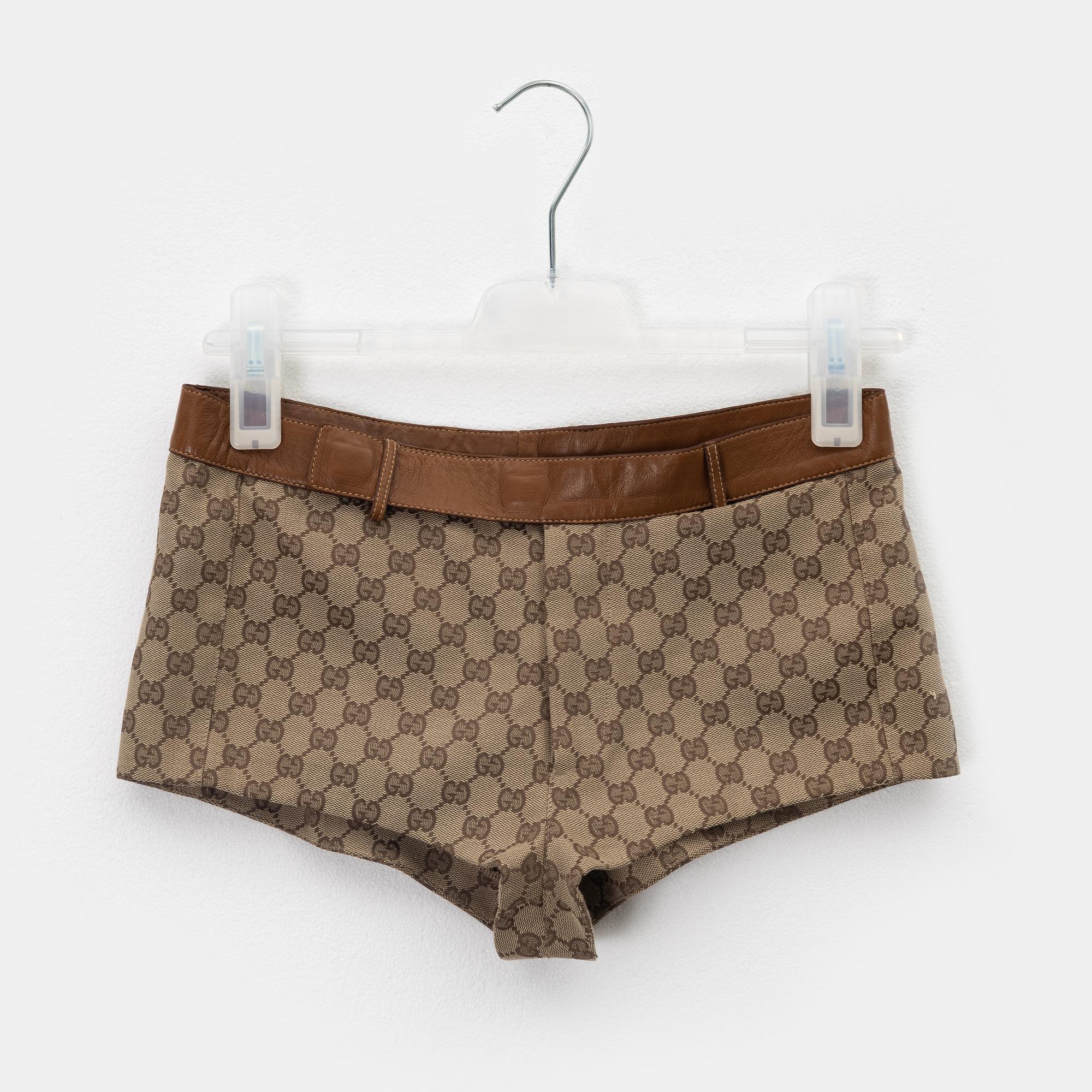 Gucci, a GG supreme jacket and shorts, size 38, 2000.