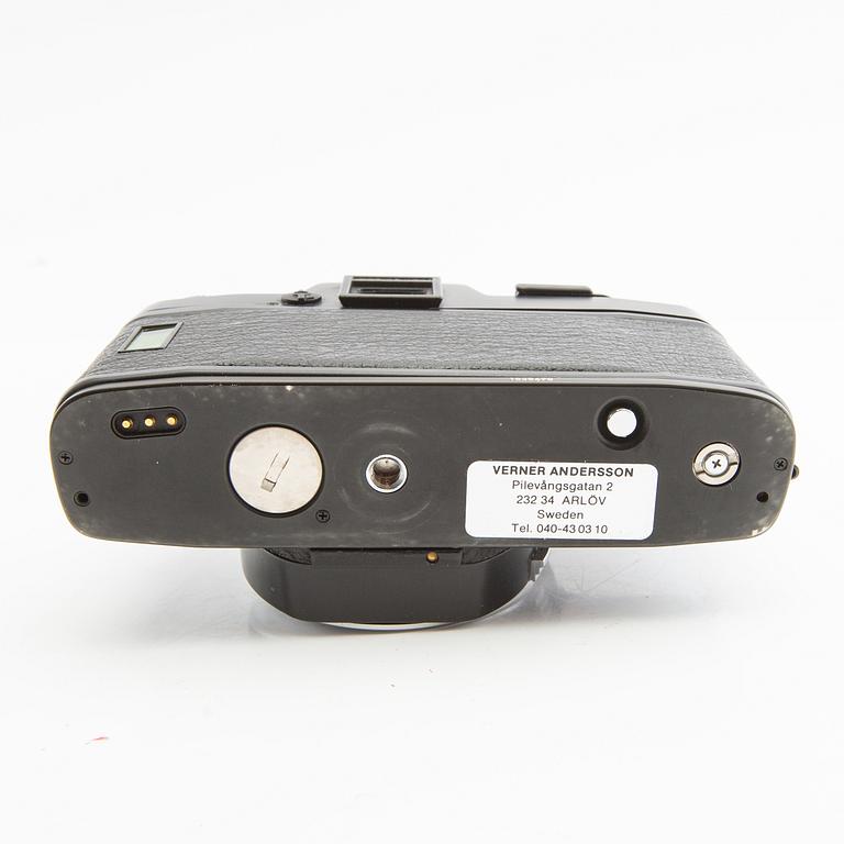 Leica R4s camera body, lens, and accessories.