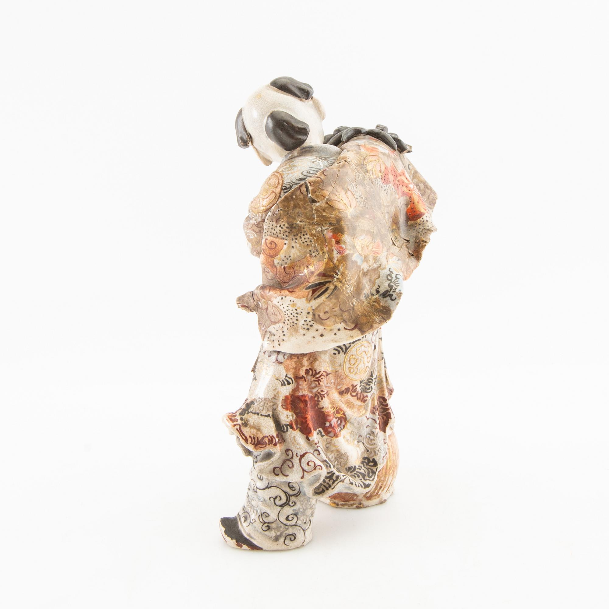 Figure Japan 20th century porcelain.