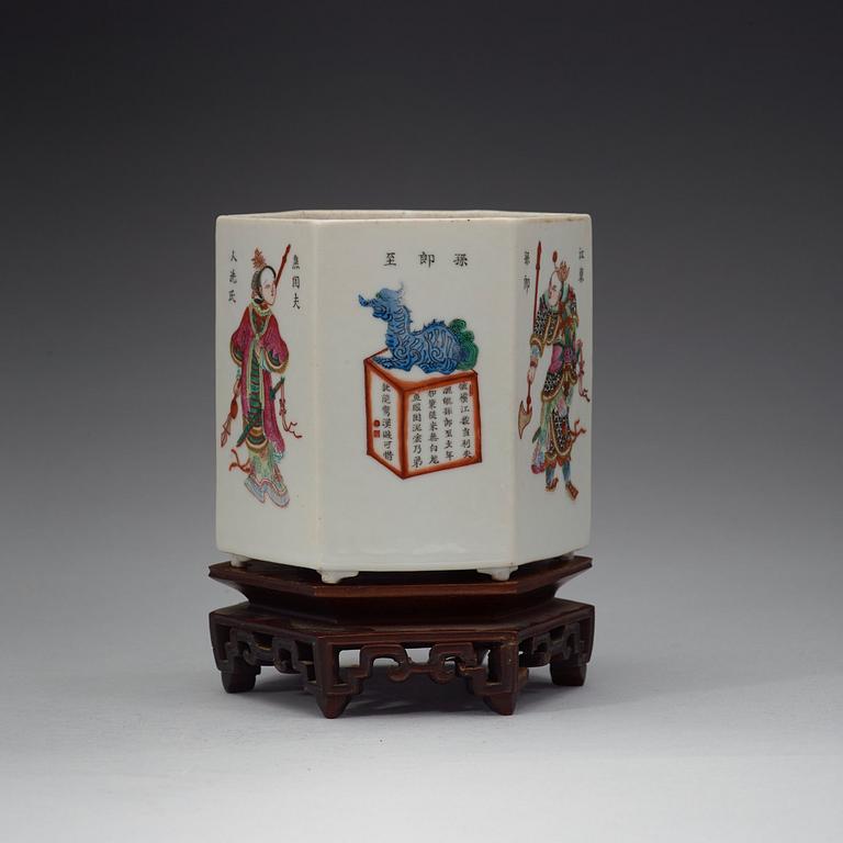 A famille rose hexagonal figure scene brushpot, Qing dynasty, 19th Century.