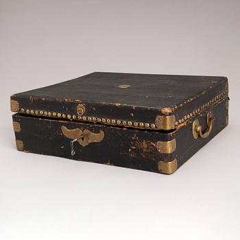 A chest of mainly Russian silverware, 60 pcs, also Sazikov and Ovchinnikov. 19th Century.