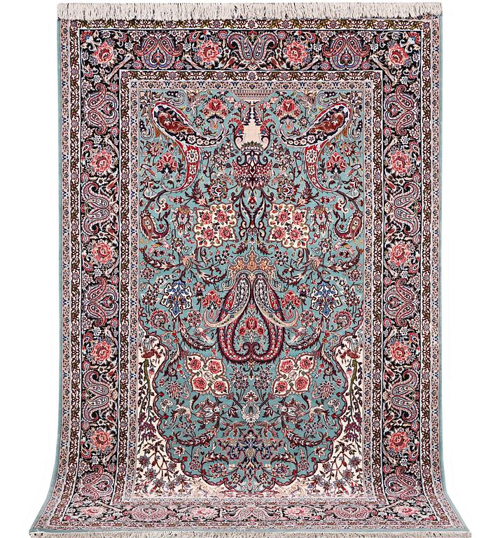 A rug, Esfahan, part silk, c. 238 x 154 cm.