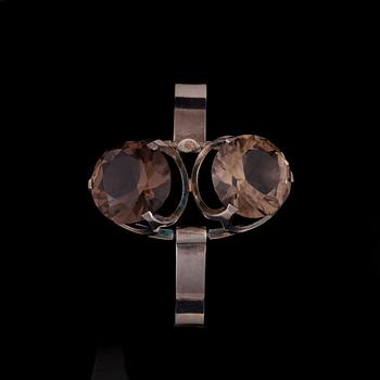 ARMBAND, silver, rökkvarts. Matti Hyvärinen, Åbo 1974. Vikt ca 26,4 g.