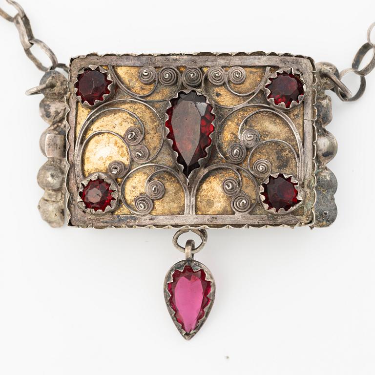 Costume jewellery, silver with glass stones.