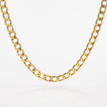 An 18K gold necklace. Unoaerre, Italy.