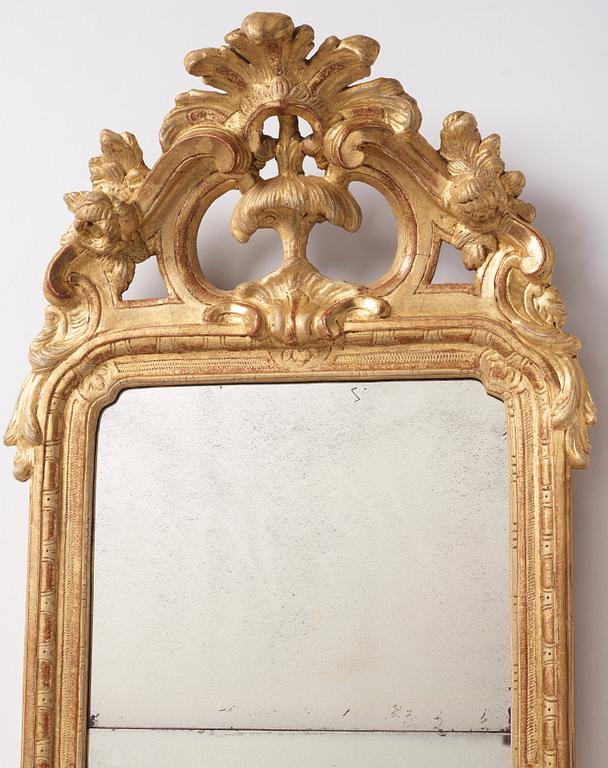 A rococo giltwood mirror by J. Åkerblad (master in Stockholm 1758-99).