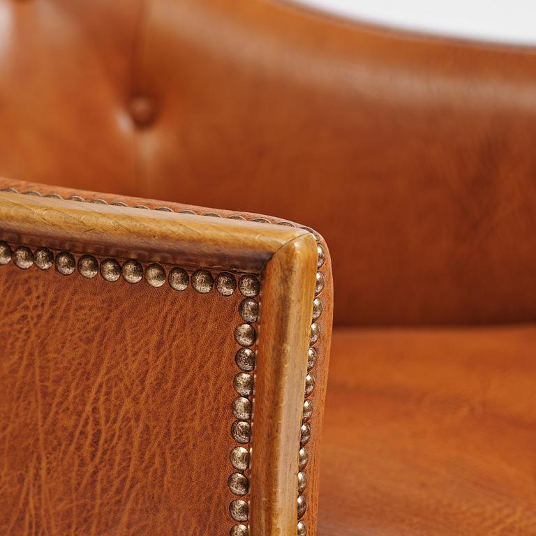 Frits Henningsen, a pair of armchairs, mid-20th century.