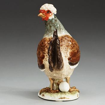 A Meissen figure of a hen with an egg, 19th Century.