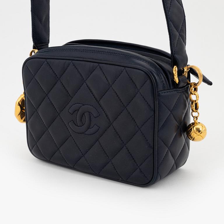 Chanel, a dark blue leather bag, 1991-1994.