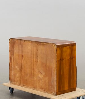 An Art Deco sidetable/cupboard.