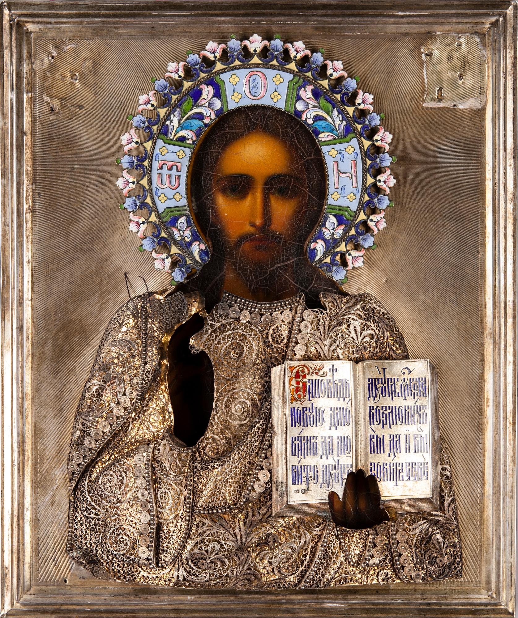 IKON med silverrisa samt emaljerad gloria, olja på pannå, Moskva 1908-1917.