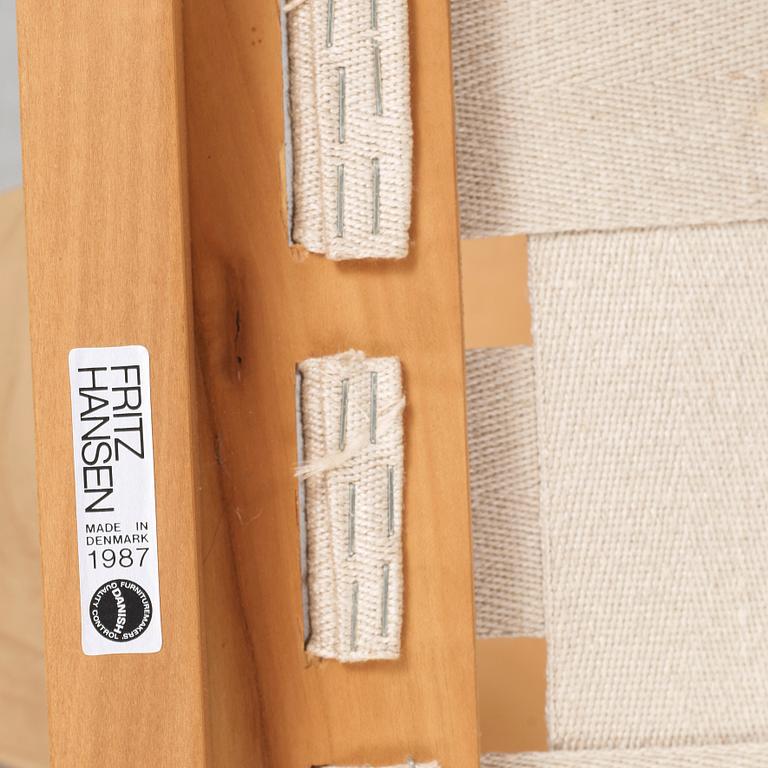 A pair of Hans J Wegner 'China chairs', Fritz Hansen, Denmark 1986-87.