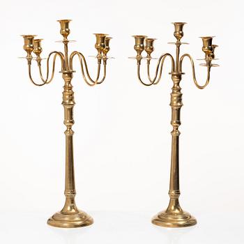 A pair of brass candelabra, model N12, Nyköpings Bruk, Sweden, around 1900.