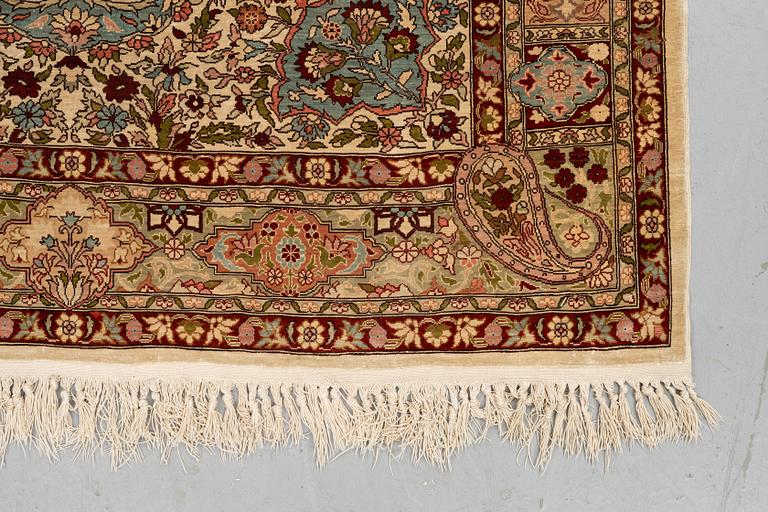 A rug, Old silk Hereke, ca 152 x 110 cm.