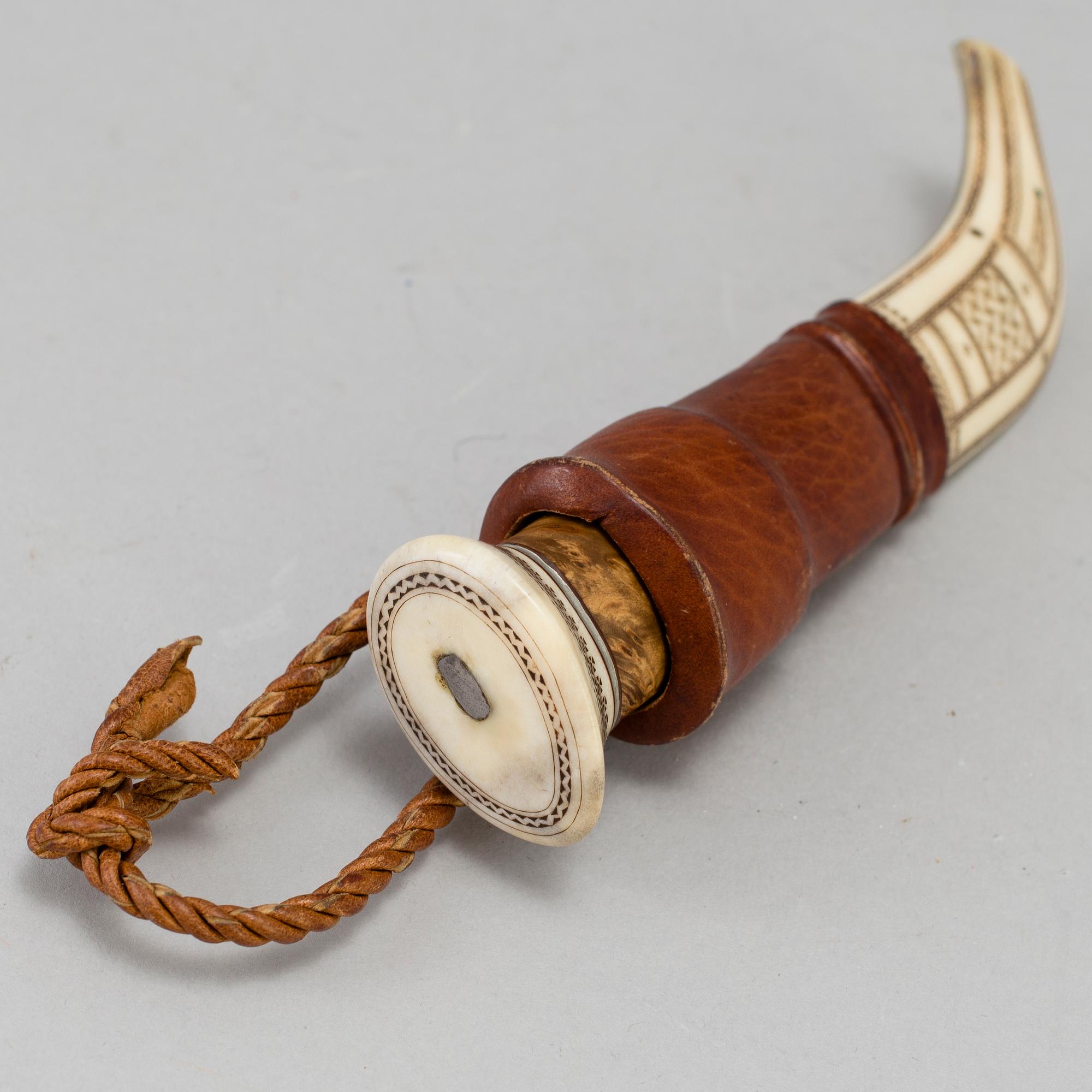 A traditional sami knife. Signed with unknown signature.