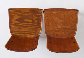 Axel Einar Hjorth, a pair of stained pine "Lovö" chairs, Nordiska Kompaniet, Sweden 1930's.