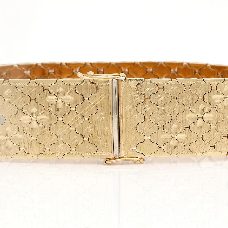 ARMBAND, tvåfärgat 18K guld, Vincenza, Italien, 1900-talets sista kvartal. Total vikt 57 g.