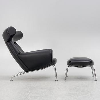 Hans J. Wegner, fåtölj med fotpall, "Ox Chair", EJ-100, Erik Jørgensen Møbelfabrik A/S, Svendborg, Danmark.